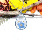 Collana goccia fiori veri Forget me not in resina uv. Ciondolo bigiotteria argento nontiscordardimé .Gioielli resina.idea regalo