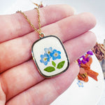 Collana donna fiori veri Forget me not in resina uv. Ciondolo bigiotteria vintage nontiscordardimé .Gioielli resina.idea regalo