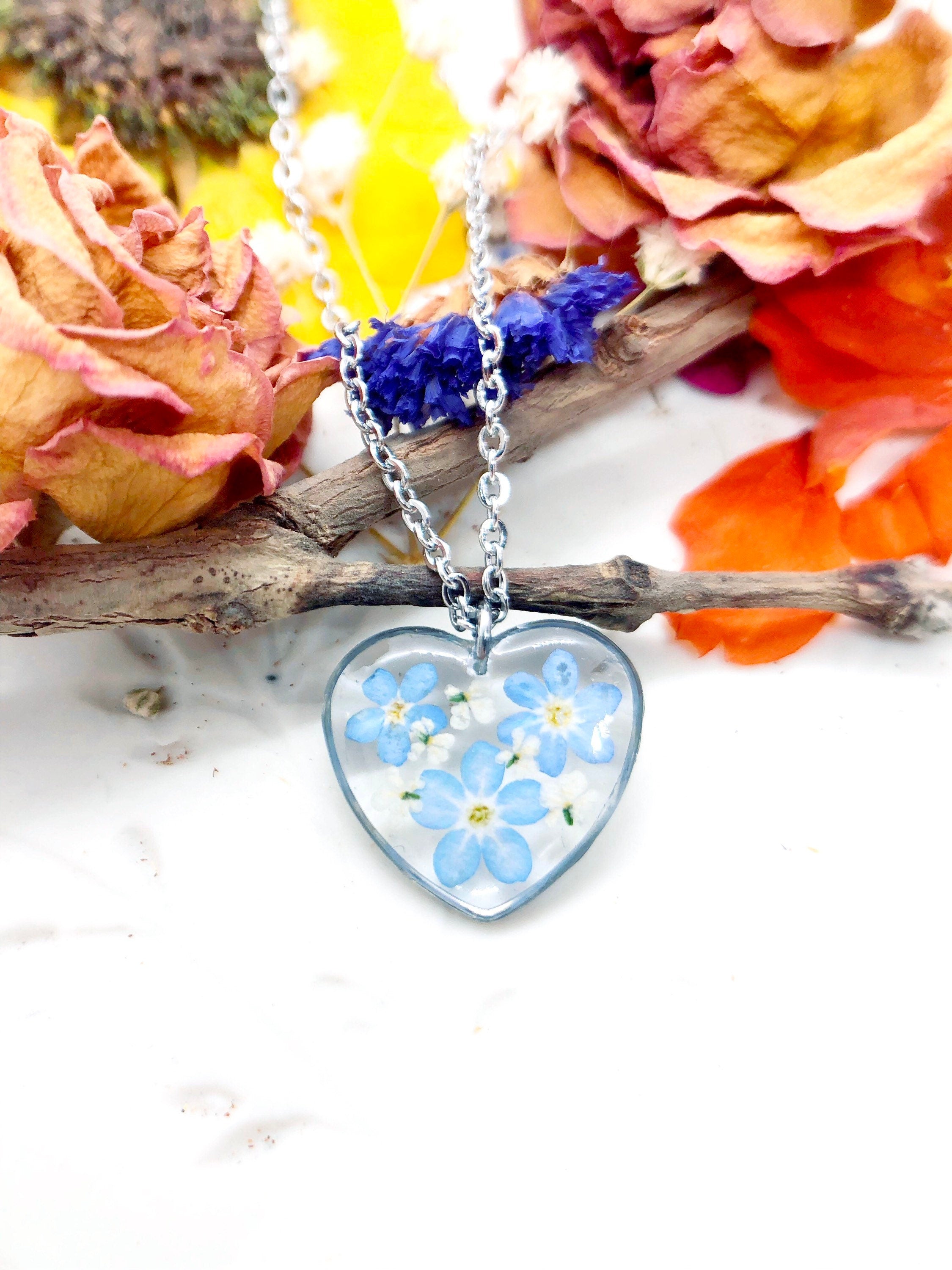 Real flowers heart necklace Forget me not in uv resin. Silver forget-me-not heart pendant. Resin jewelry. Dried pressed flowers