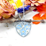 Real flowers heart necklace Forget me not in uv resin. Silver forget-me-not heart pendant. Resin jewelry. Dried pressed flowers