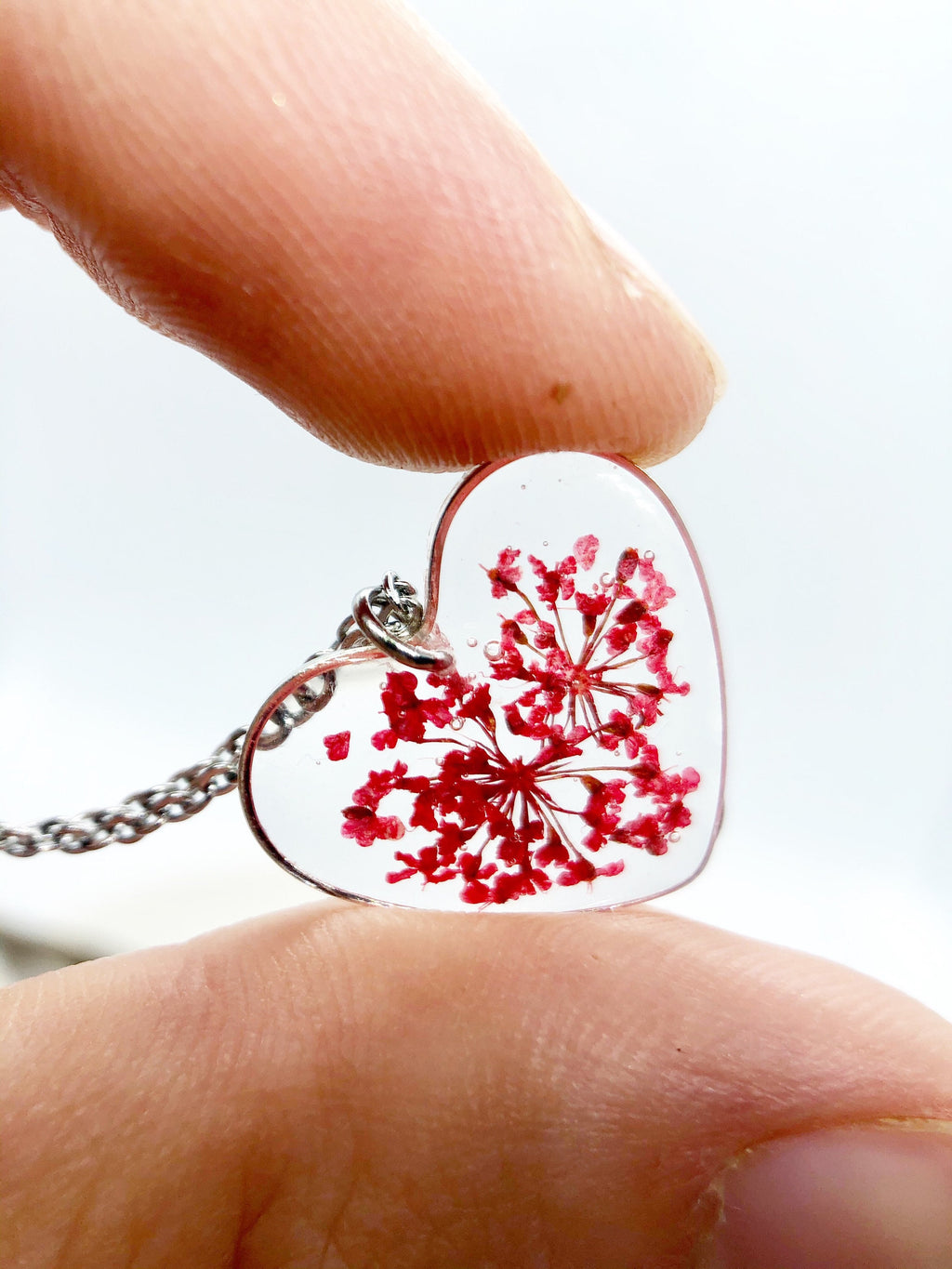 Woman heart pendant necklace with real red flowers in resin. Steel chain. Minimalist jewelry botany terrarium nature