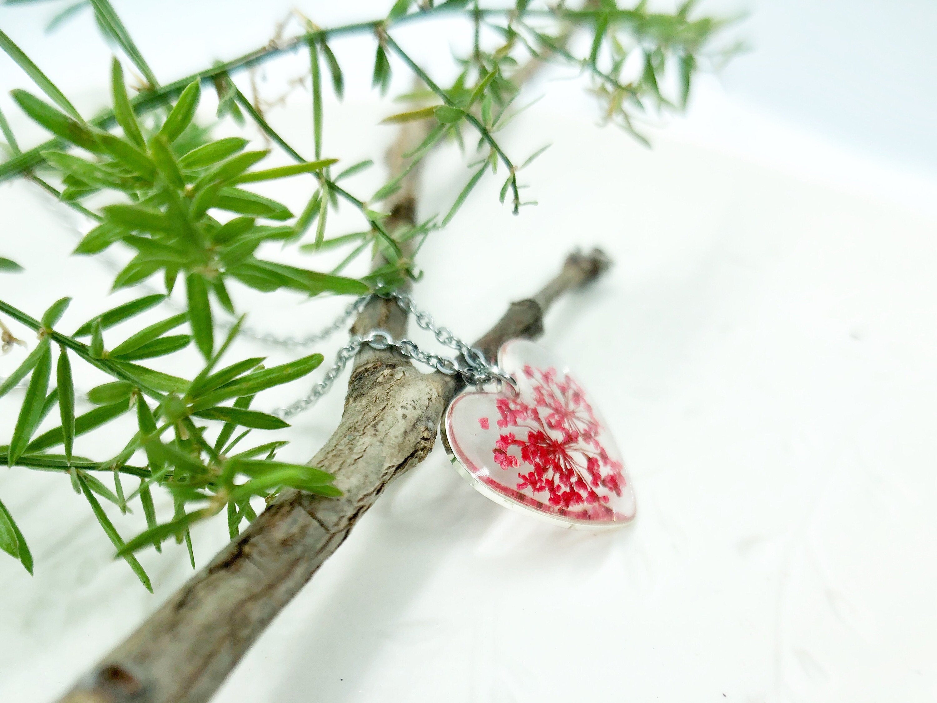 Woman heart pendant necklace with real red flowers in resin. Steel chain. Minimalist jewelry botany terrarium nature