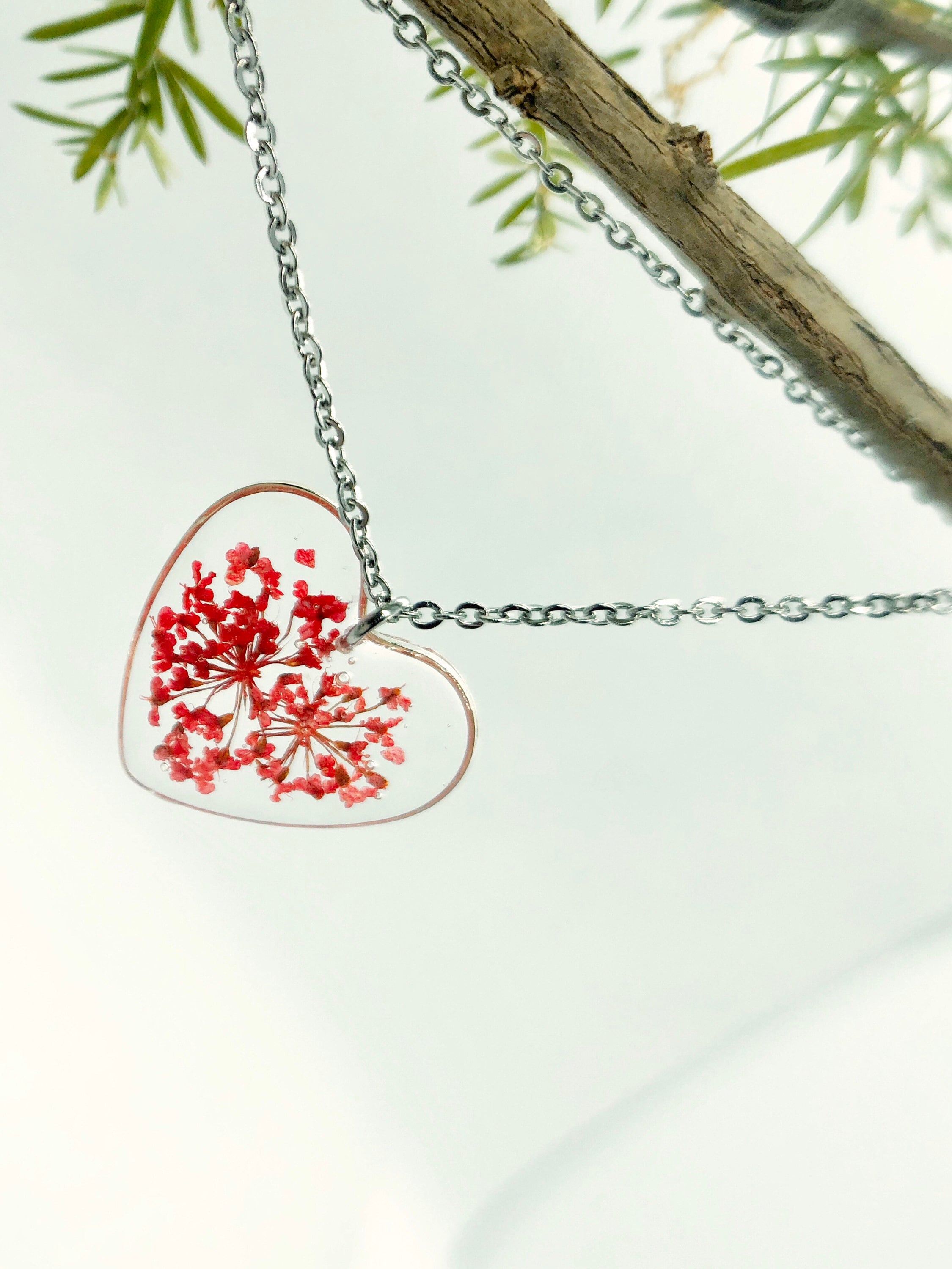 Woman heart pendant necklace with real red flowers in resin. Steel chain. Minimalist jewelry botany terrarium nature