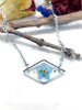 Collana ciondolo fiori veri azzurri Forget me not resina.Catenella acciaio argento Gioielli botanical terrarium nontiscordardimé