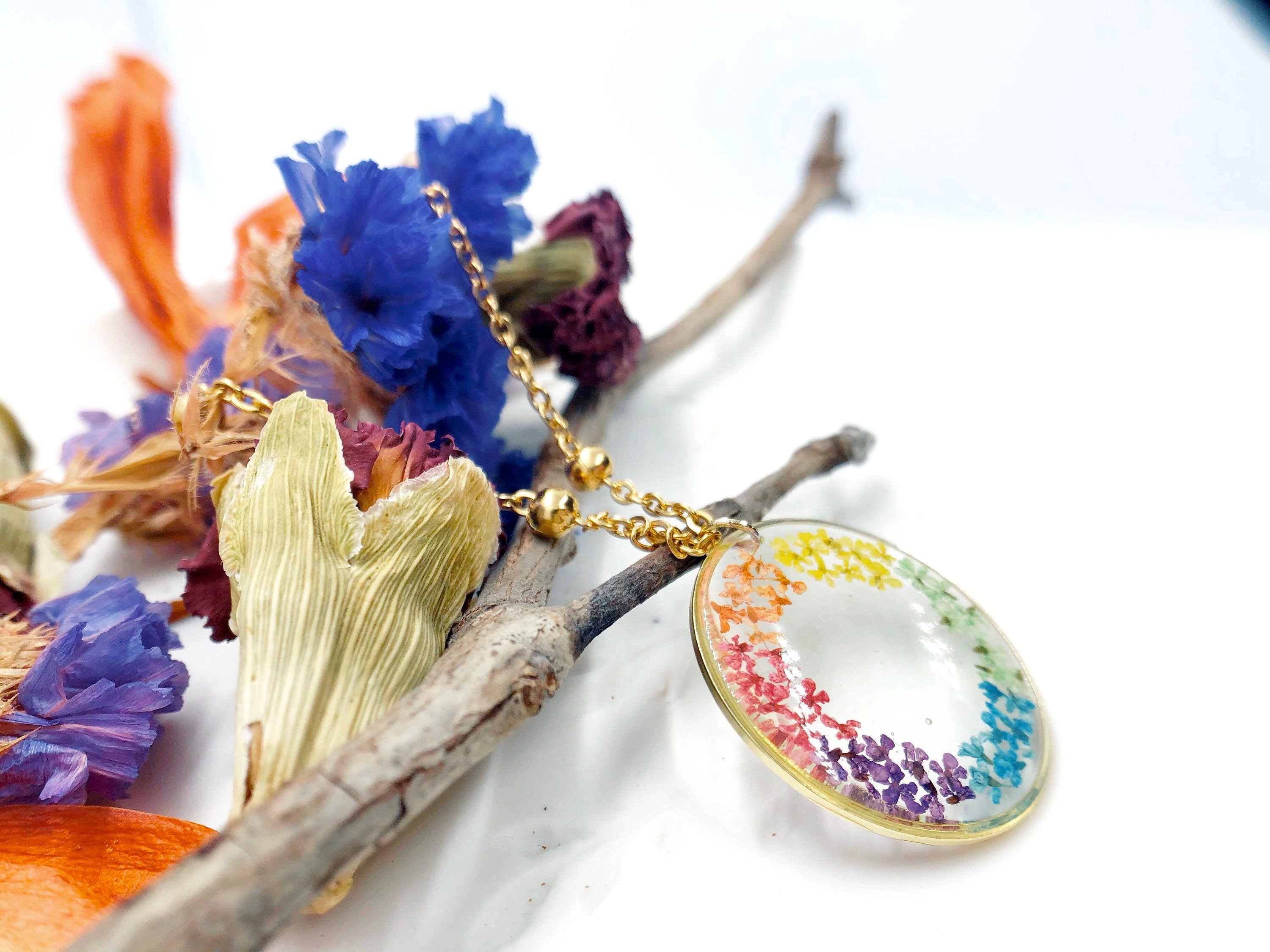 Rainbow women's necklace with real dried pressed flowers in resin, gold steel chain. Real flower resin jewelry. Rainbow pendant.hippie style