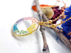 Rainbow women's necklace with real dried pressed flowers in resin, gold steel chain. Real flower resin jewelry. Rainbow pendant.hippie style