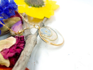 Forget me not real flower necklace and UV resin opal flakes. 18k gold plated Circles pendant.Resin jewelry.Forget-me-not pressed flowers