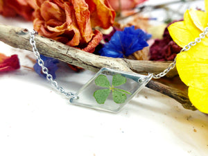 Bracciale donna terrarium fiore vero quadrifoglio portafortuna Ciondolo resina catenella acciaio regolabile taglia unica.Gioielli resina