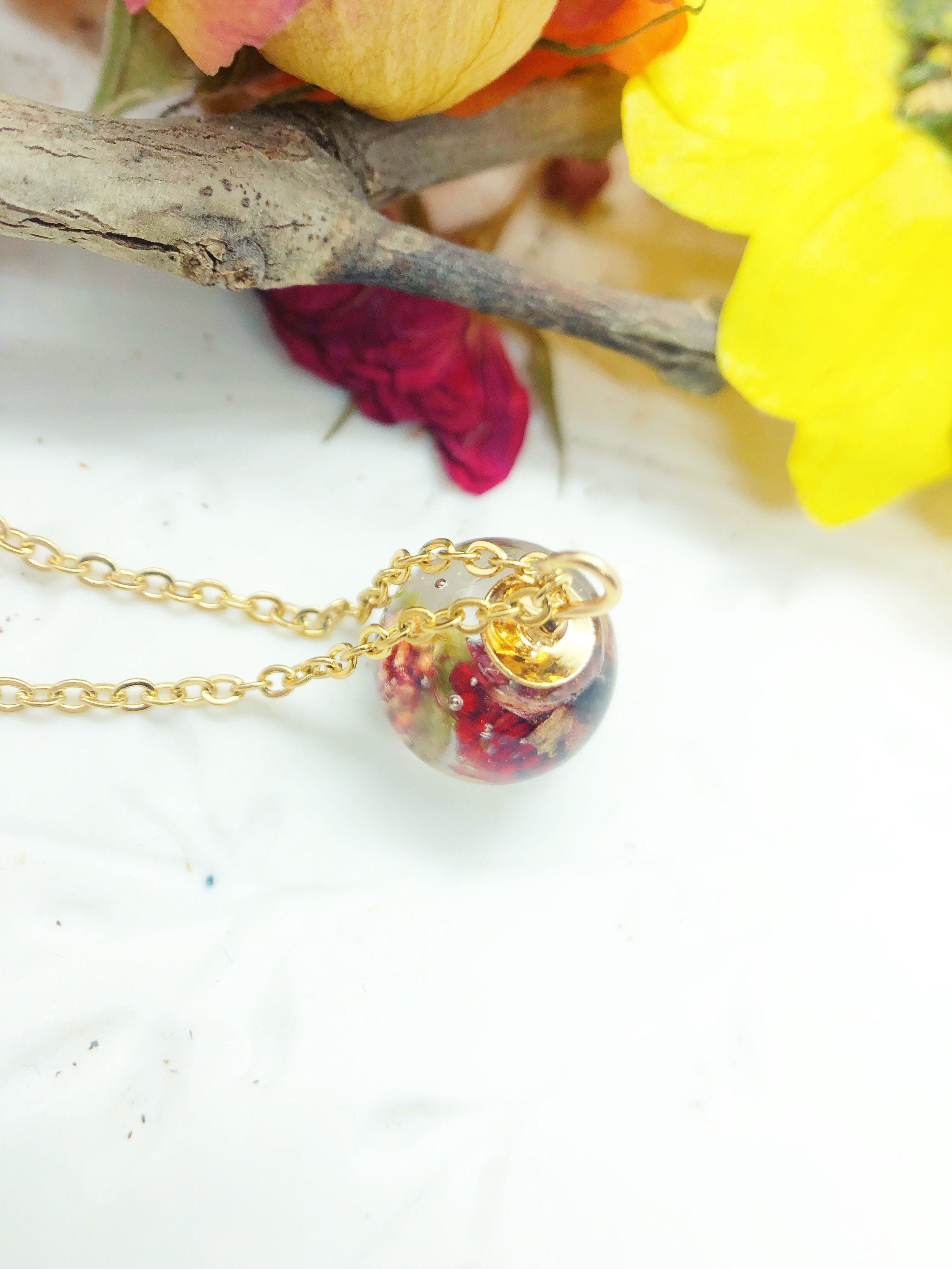 Women's mini sphere necklace real wild strawberry in uv resin. Golden steel chain pendant. Resin jewelry. Pressed dried flowers