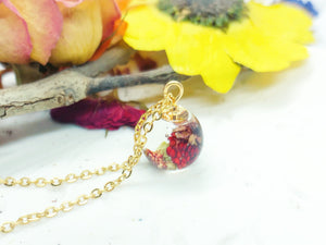 Women's mini sphere necklace real wild strawberry in uv resin. Golden steel chain pendant. Resin jewelry. Pressed dried flowers