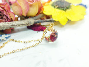 Women's mini sphere necklace real wild strawberry in uv resin. Golden steel chain pendant. Resin jewelry. Pressed dried flowers