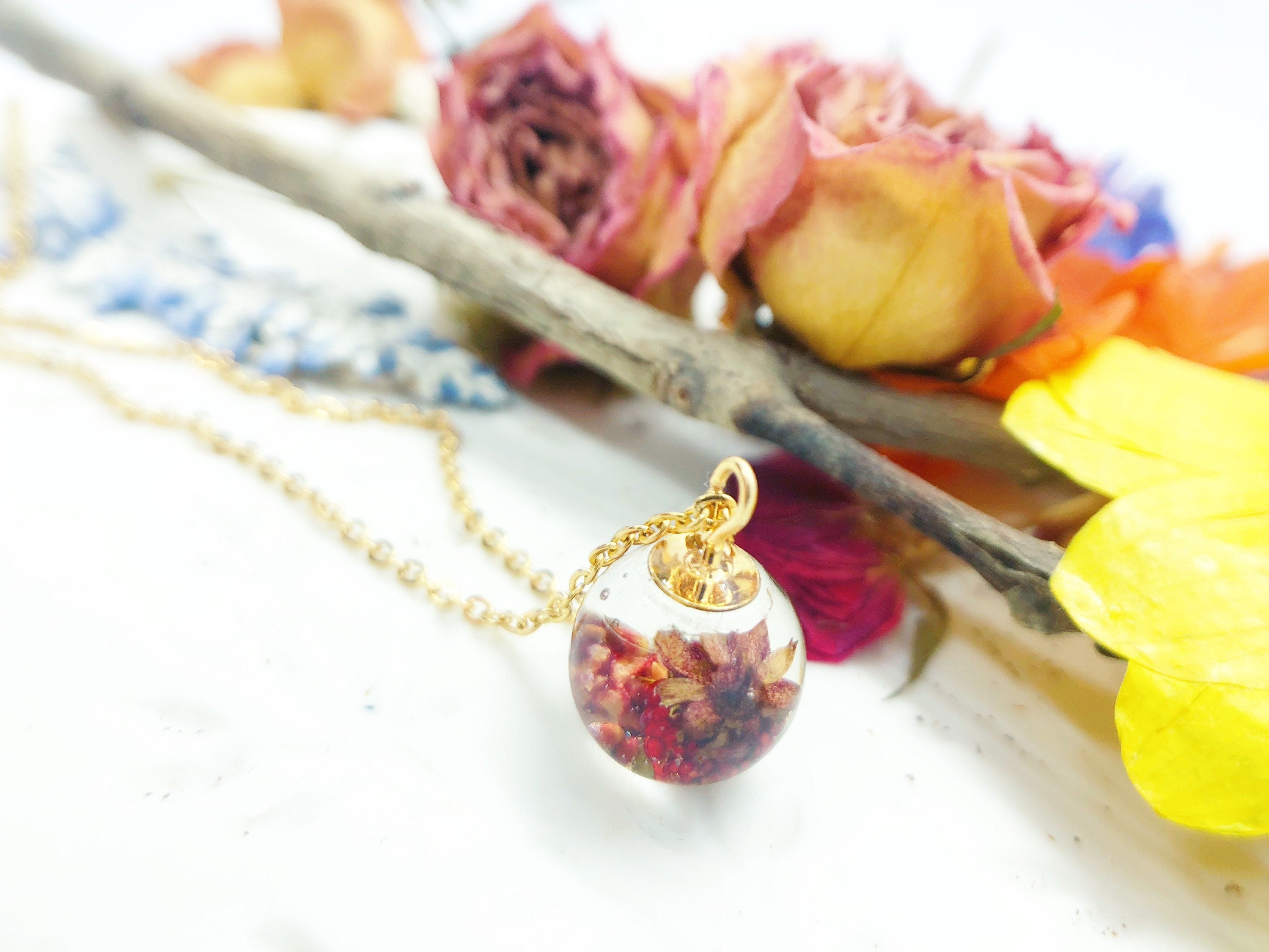 Women's mini sphere necklace real wild strawberry in uv resin. Golden steel chain pendant. Resin jewelry. Pressed dried flowers