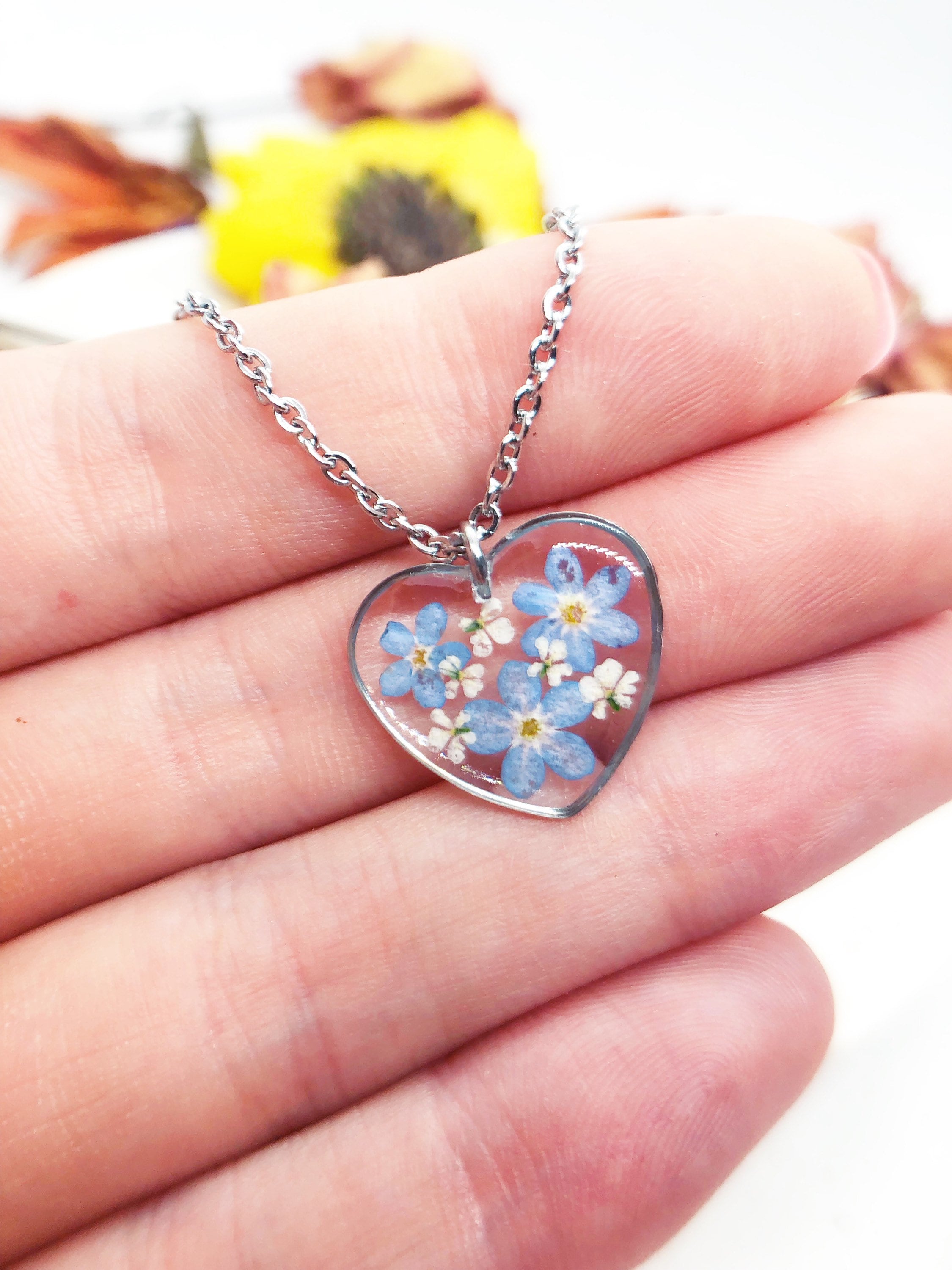 Real flowers heart necklace Forget me not in uv resin. Silver forget-me-not heart pendant. Resin jewelry. Dried pressed flowers