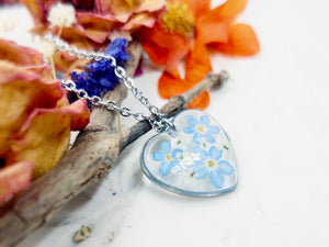 Real flowers heart necklace Forget me not in uv resin. Silver forget-me-not heart pendant. Resin jewelry. Dried pressed flowers