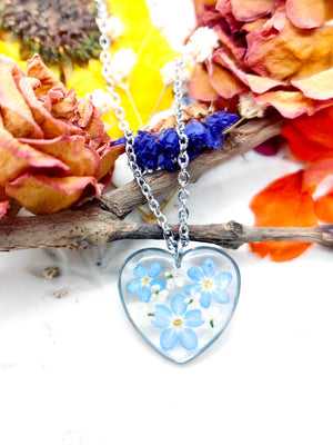 Real flowers heart necklace Forget me not in uv resin. Silver forget-me-not heart pendant. Resin jewelry. Dried pressed flowers