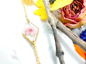 Bracciale donna terrarium fiore vero selvatico rosa. Ciondolo resina catenella acciaio regolabile taglia unica.Gioielli resina fiori.