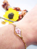 Bracciale donna terrarium fiore vero selvatico rosa. Ciondolo resina catenella acciaio regolabile taglia unica.Gioielli resina fiori.